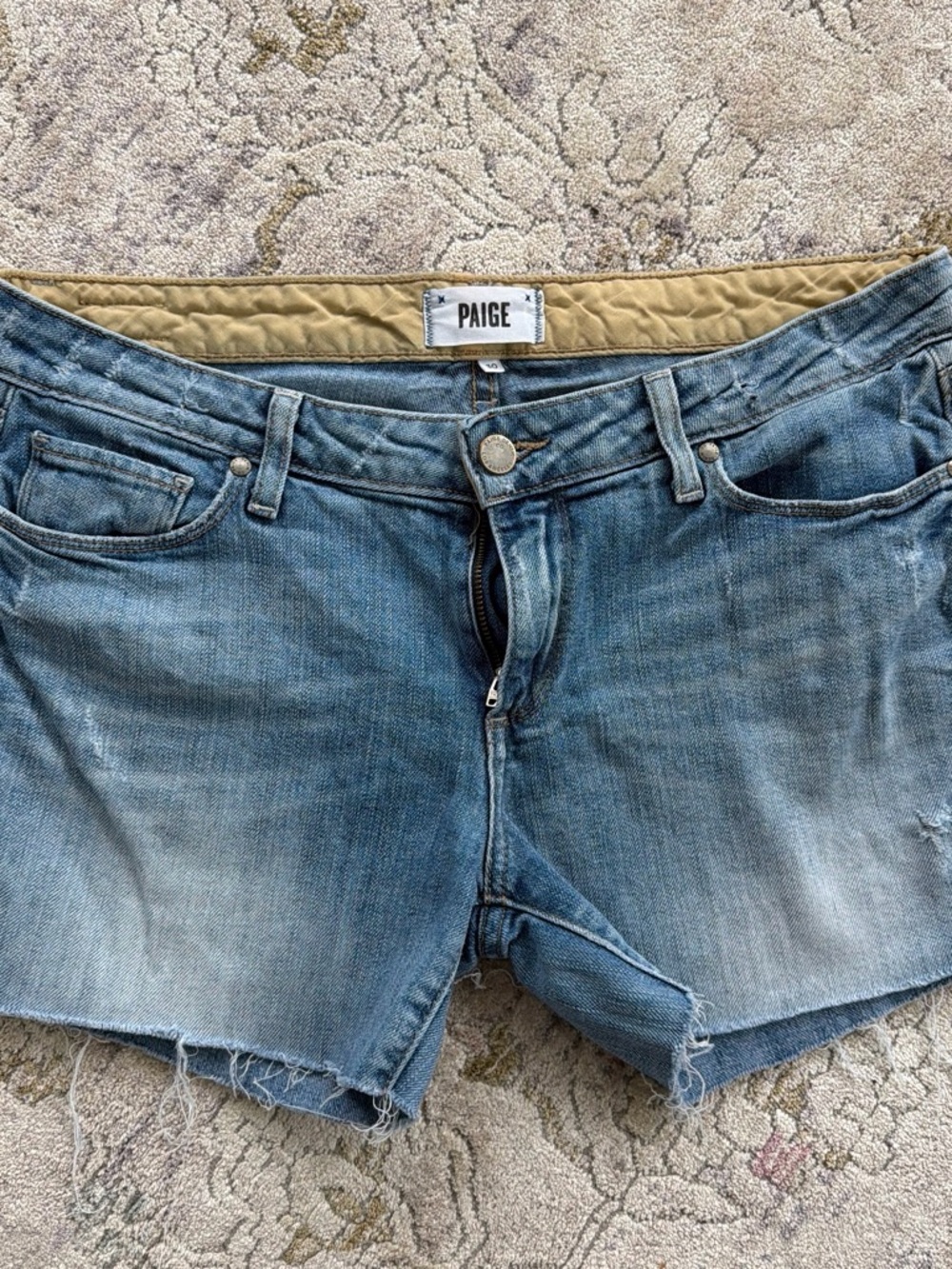 PAIGE Washed Blue Denim Cutoff Shorts